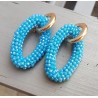 Creolen met grote ovale blauw kleurige Kristallen
