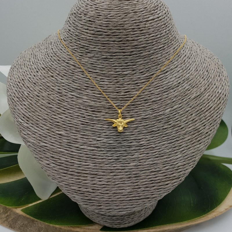 Vergulde ketting met klein stieren kop hangertje