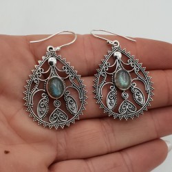 Zilveren oorbellen ovale cabochon Labradoriet bewerkte setting