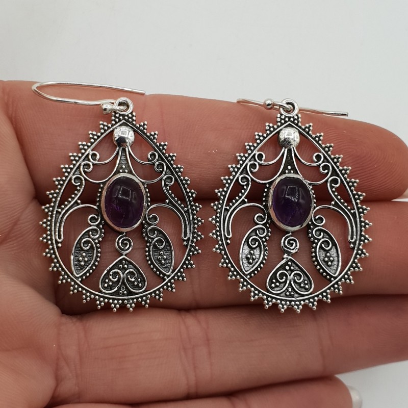 Zilveren oorbellen ovale cabochon Amethist bewerkte setting