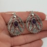 Zilveren oorbellen ovale cabochon Amethist bewerkte setting