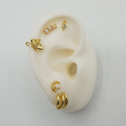 Vergulde earcuffs bij