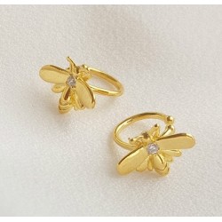 Vergulde earcuffs bij