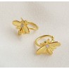 Vergulde earcuffs bij