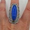 Zilveren ring met blauw Chalcedoon en bewerkte kop