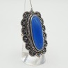 Zilvren ring met blauw Chalcedoon gezet in bewerkte setting