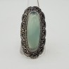 Zilveren ring met aqua Chalcedoon en bewerkte kop
