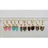 Vergulde creolen met punt hanger van aqua quartz