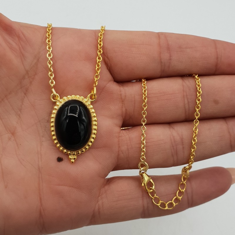Vergulde ketting met ovale zwarte Onyx hanger