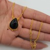 Vergulde ketting met druppelvormige zwarte Onyx hanger