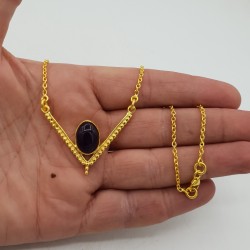 Vergulde ketting met hanger gezet met ovale Amethist