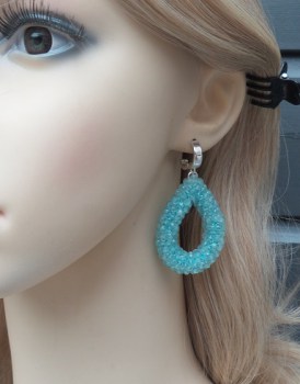 Zilveren oorbellen met open druppel van facet Aquamarijn