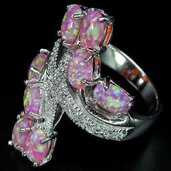 Zilveren edelsteen ring roze fire Opaal maat 16.9 mm.