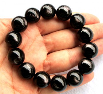 Stretch armband met grote zwarte Obsidiaan kralen